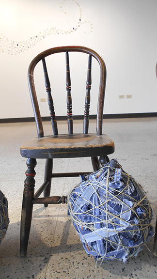 Rita Grendze, "unbiased fair equal balanced unprejudiced smooth plum uniform equitable flush even honest level just", vintage chairs, twine, fabric, rope, and denim, University of St. Francis Gallery, Joliet, IL, 2016